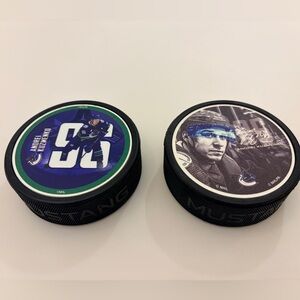 Official NHL Vancouver Canucks Andrei Kuzmenko Player Hockey Pucks Lot Bundle